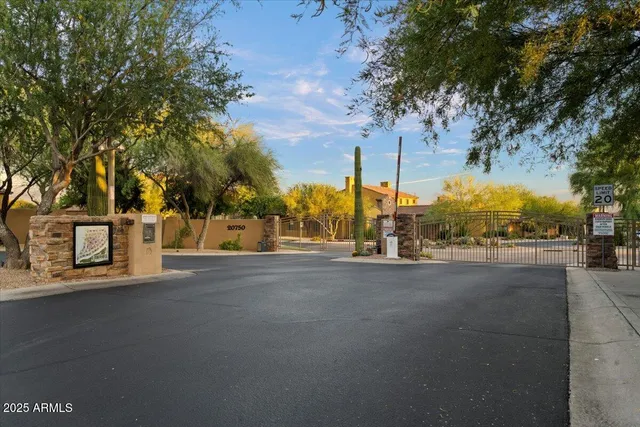 a view of a street with houses on both side