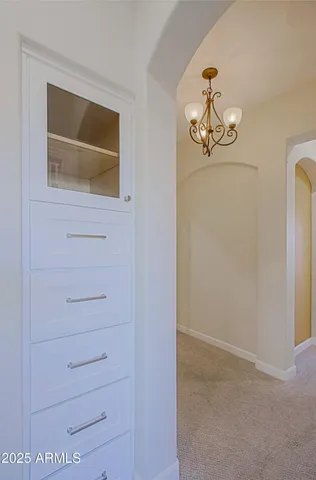 a bedroom with a large bed and a large window