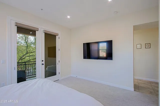 a view of balcony with furniture