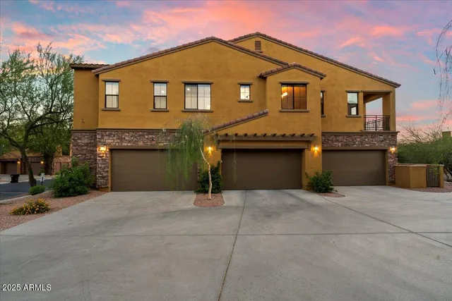 a view of a swimming pool with outdoor seating
