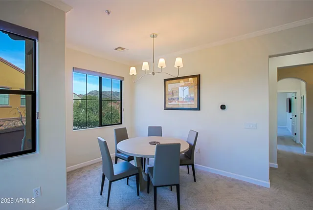 a view of a workspace with furniture