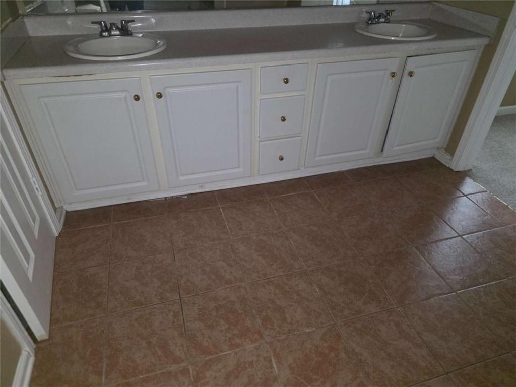 4410 Cross Lane Decatur, GA 30035 - Photo 21 of 26 a bathroom with a sink and vanity