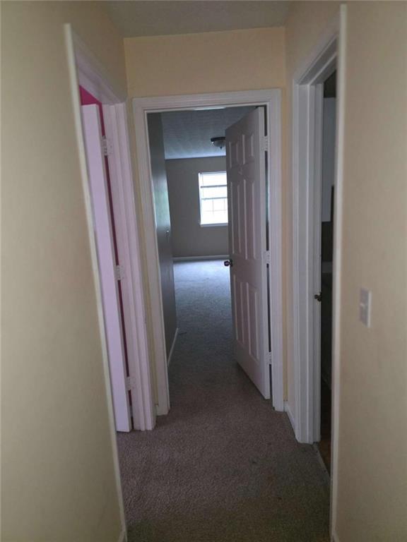 4410 Cross Lane Decatur, GA 30035 - Photo 22 of 26 a view of a hallway with wooden floor