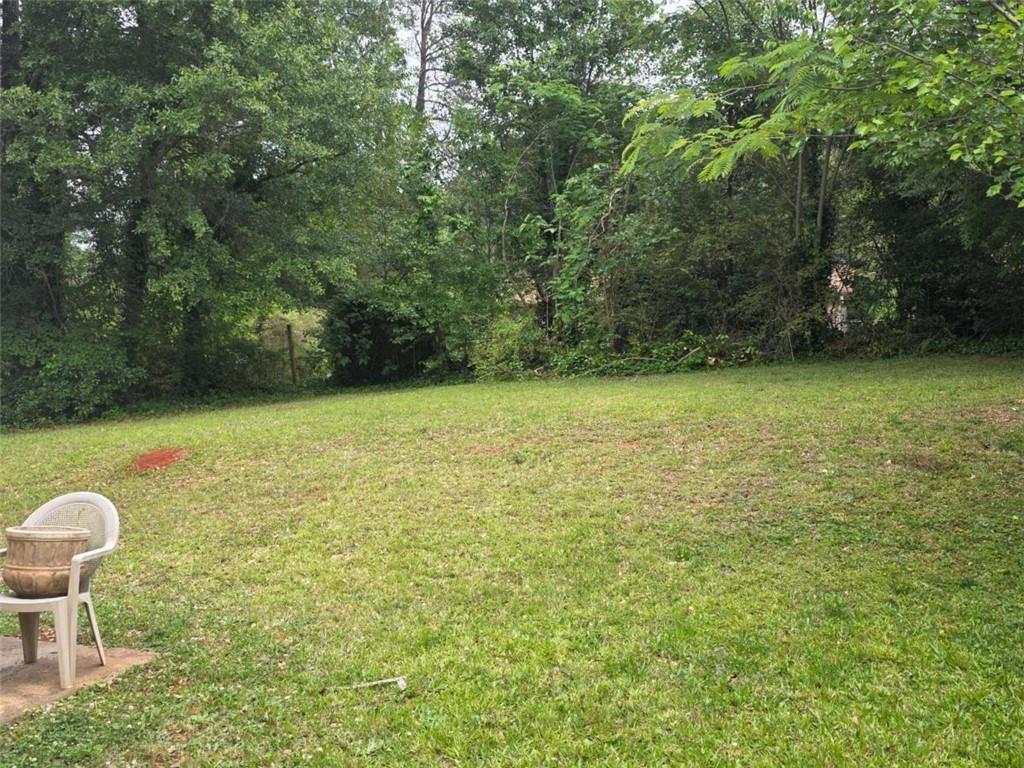 4410 Cross Lane Decatur, GA 30035 - Photo 3 of 26 a view of a swimming pool and an outdoor space