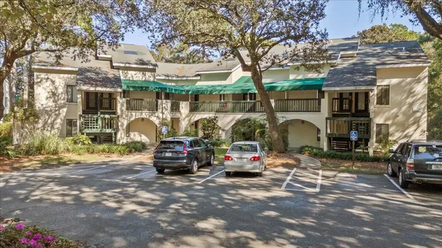 a view of car parked in front of house