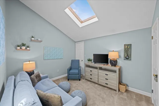 a living room with furniture and a couch