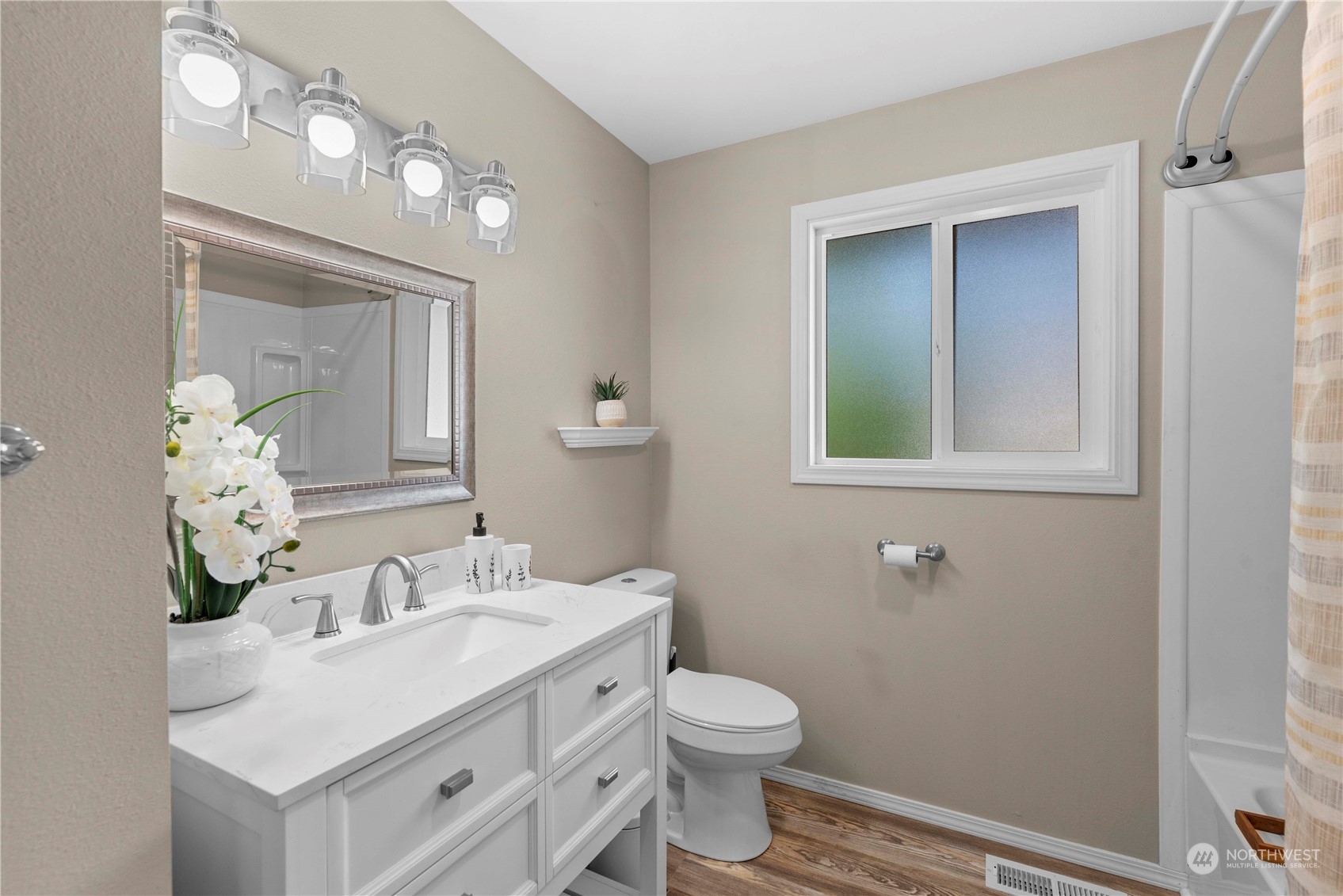 403 Marilyn Avenue Wenatchee, WA 98801 - Photo 19 of 24 a bathroom with a sink vanity granite and toilet