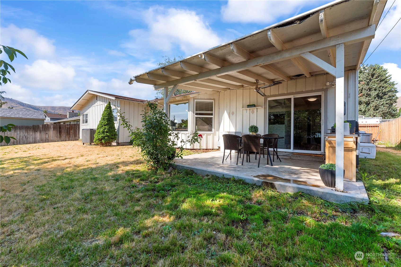 403 Marilyn Avenue Wenatchee, WA 98801 - Photo 23 of 24 a view of house with backyard and porch