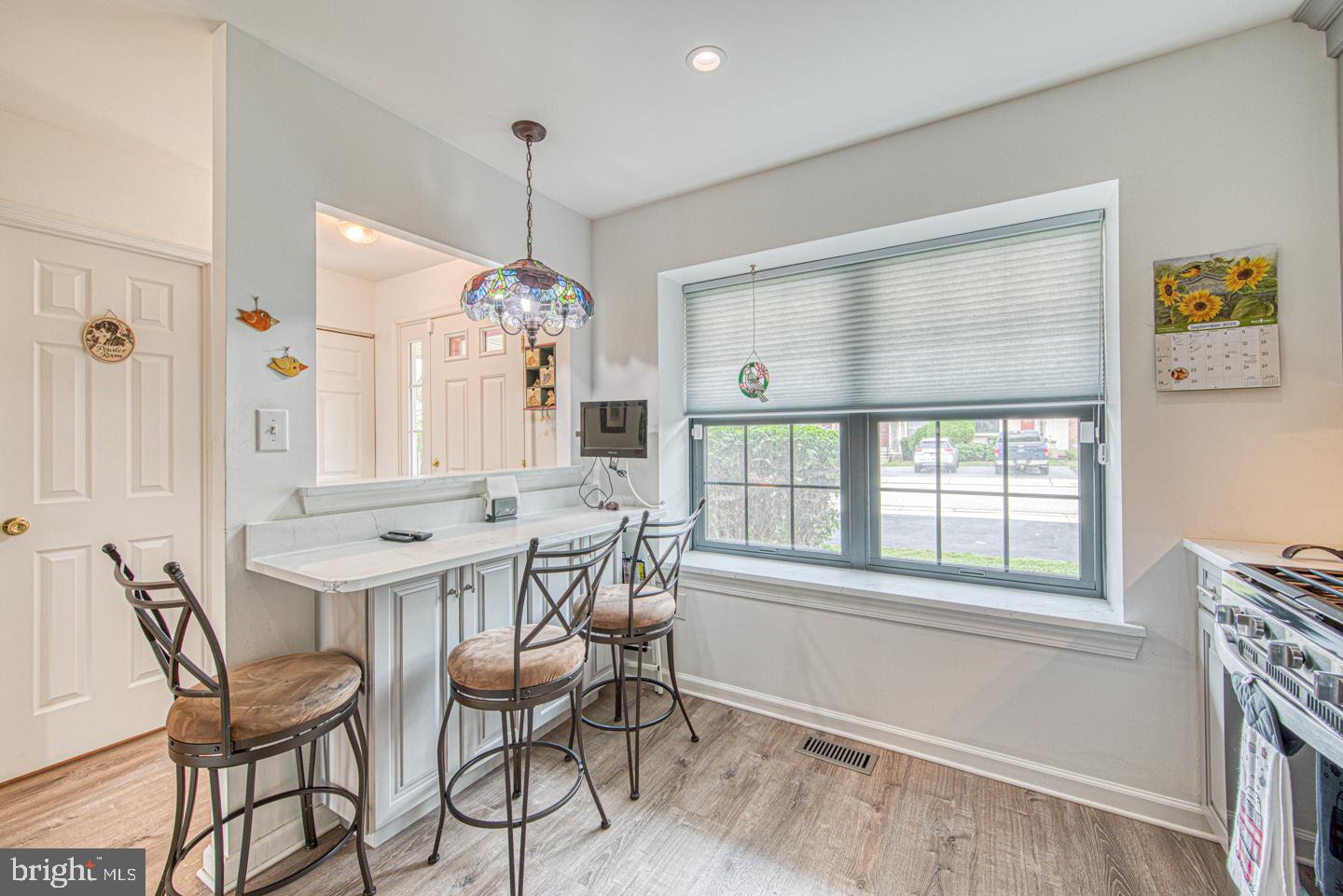 333 Scola Road Brookhaven, PA 19015 - Photo 13 of 57 a view of a dining room with furniture window and outside view