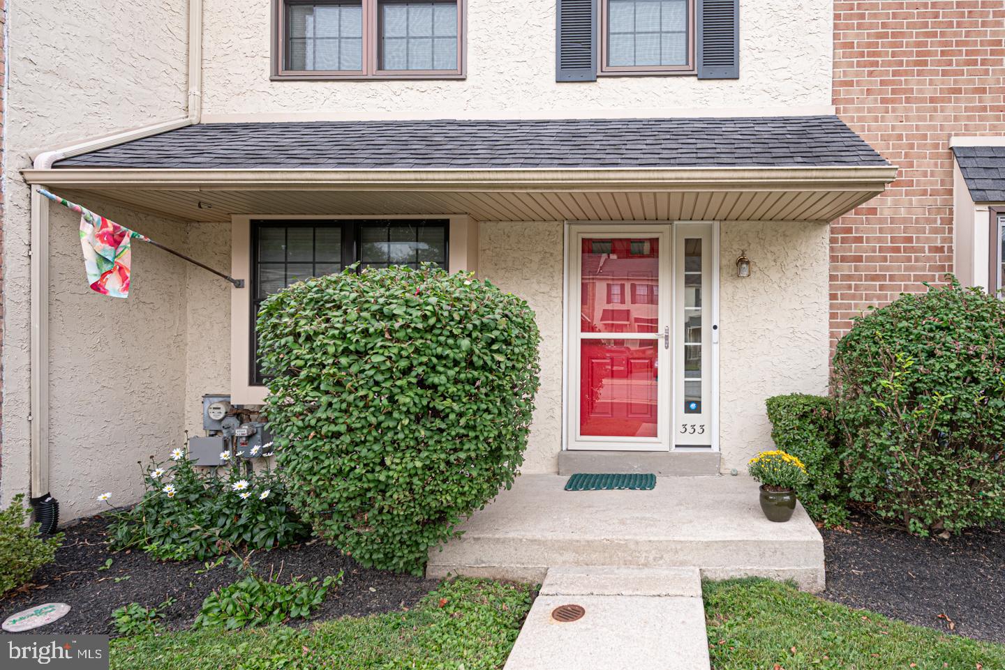333 Scola Road Brookhaven, PA 19015 - Photo 2 of 57 a front view of a house with garden