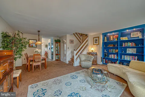 a living room with furniture and a couch