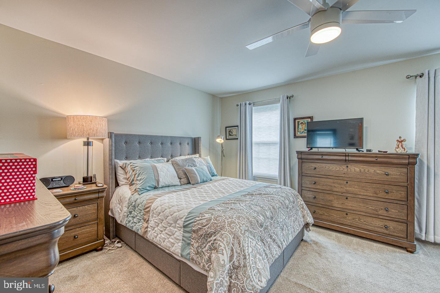 333 Scola Road Brookhaven, PA 19015 - Photo 32 of 57 a bedroom with a bed and a television