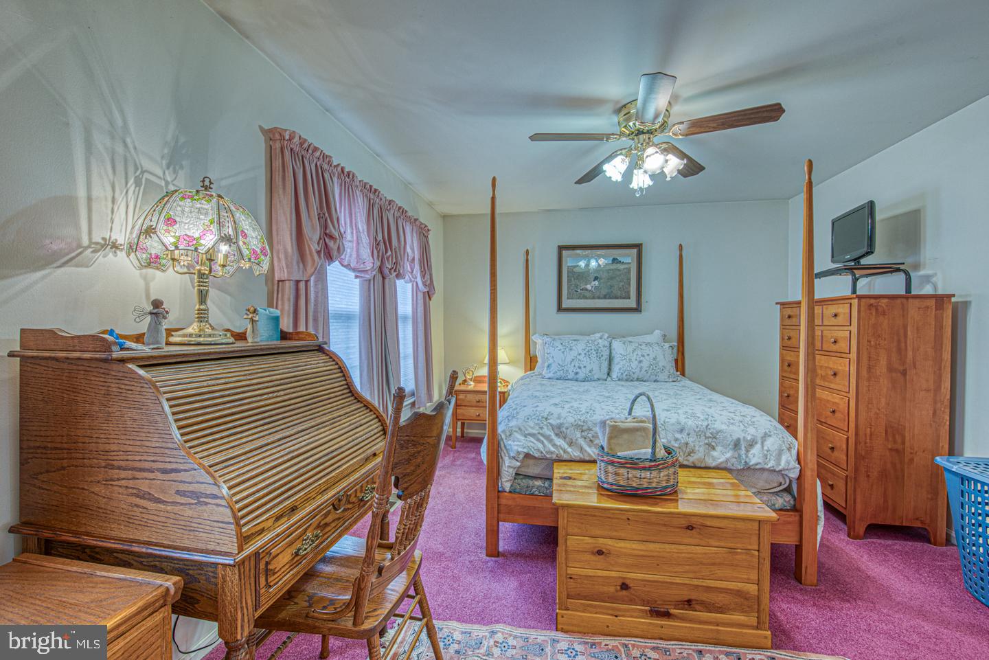 333 Scola Road Brookhaven, PA 19015 - Photo 36 of 57 a living room with furniture and a chandelier