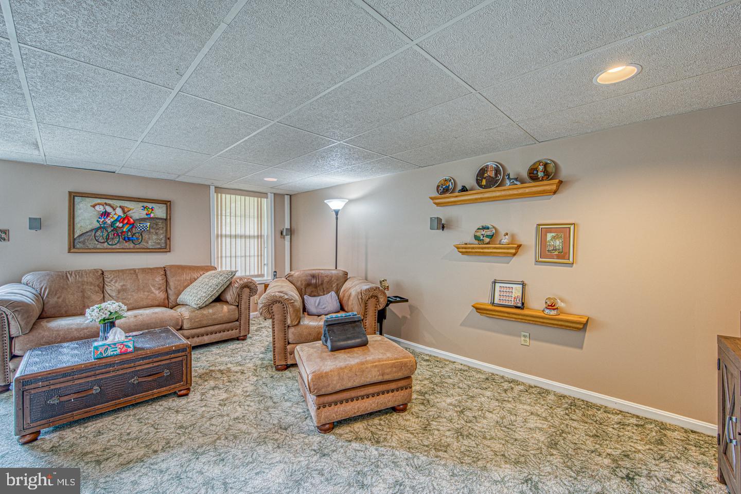 333 Scola Road Brookhaven, PA 19015 - Photo 39 of 57 a living room with furniture and a wooden floor