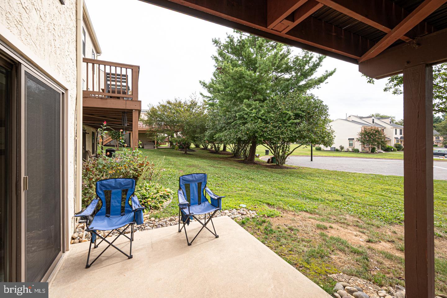 333 Scola Road Brookhaven, PA 19015 - Photo 48 of 57 a view of a porch with furniture and garden