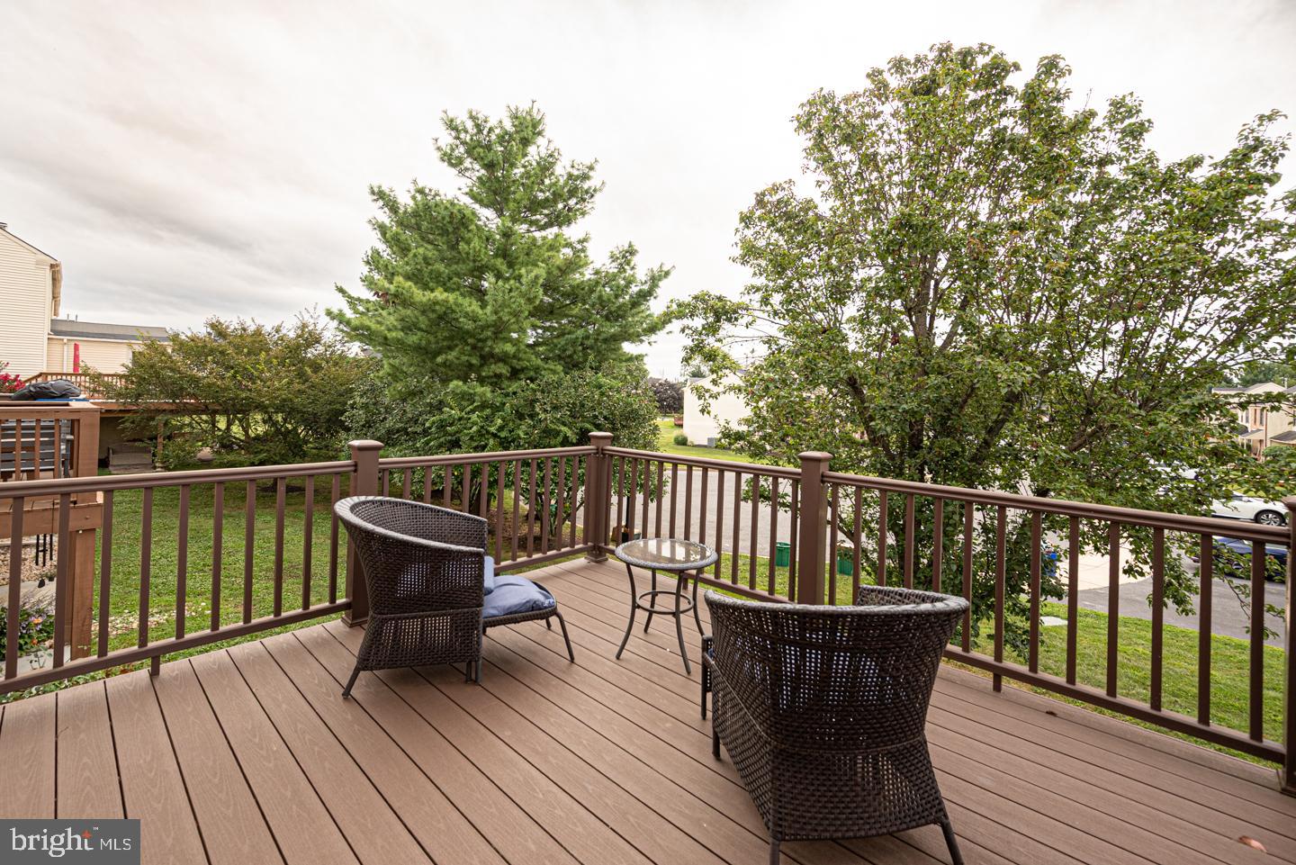333 Scola Road Brookhaven, PA 19015 - Photo 55 of 57 a balcony with wooden floor table and chairs