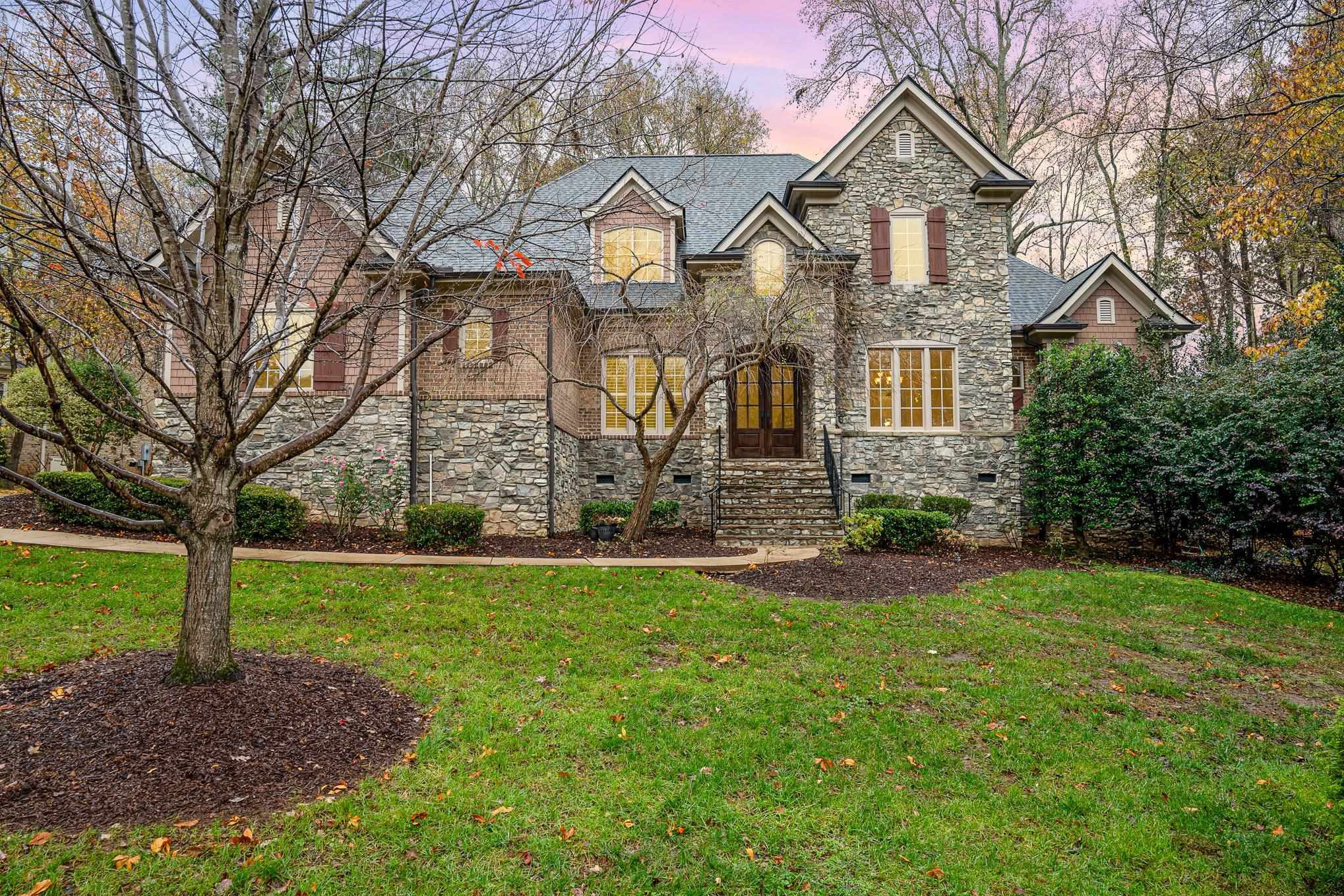 1817 Silver Mist Court Raleigh, NC 27613 - Photo 1 of 40 a front view of a house with garden