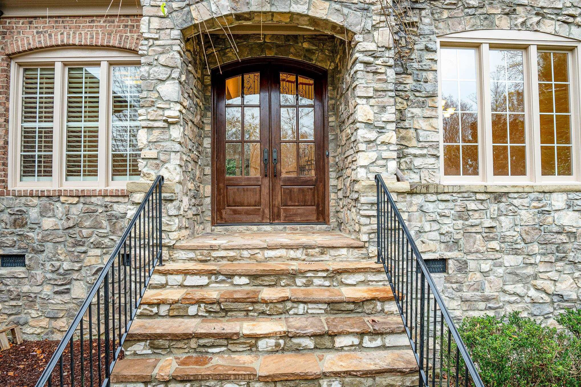 1817 Silver Mist Court Raleigh, NC 27613 - Photo 2 of 40 a front view of a house with a yard