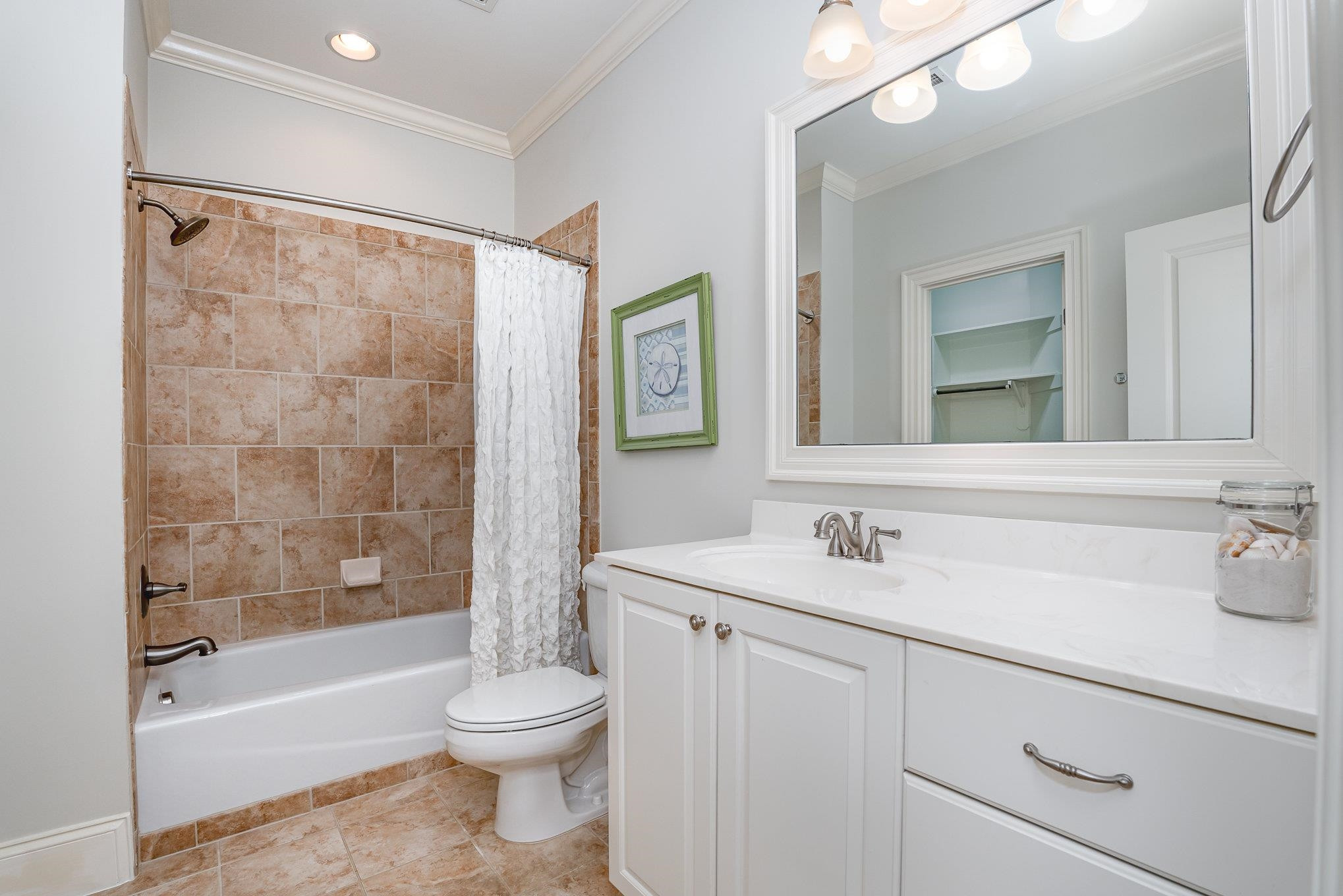 1817 Silver Mist Court Raleigh, NC 27613 - Photo 21 of 40 a bathroom with a sink toilet and shower