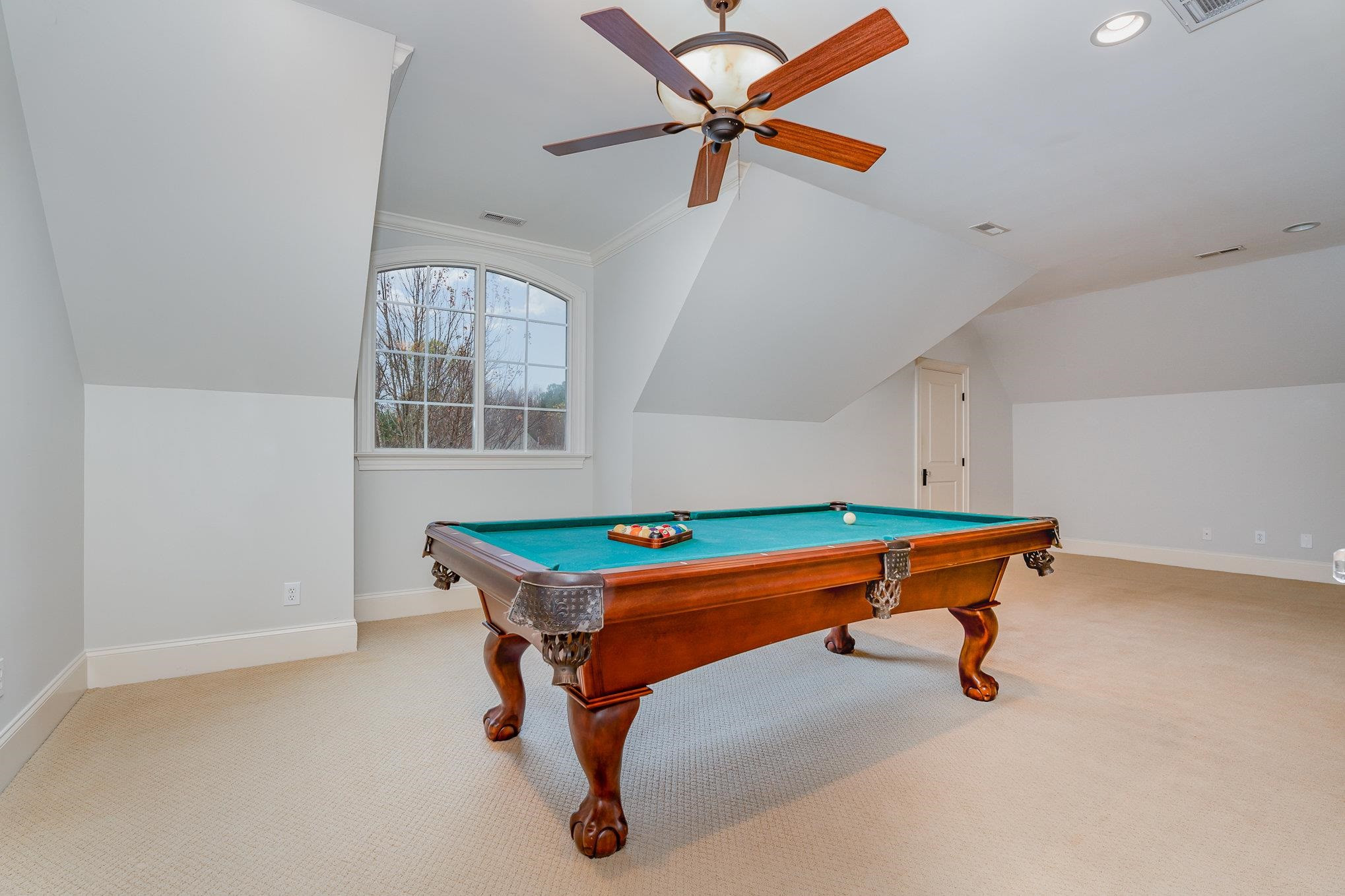 1817 Silver Mist Court Raleigh, NC 27613 - Photo 25 of 40 a room with pool table and windows