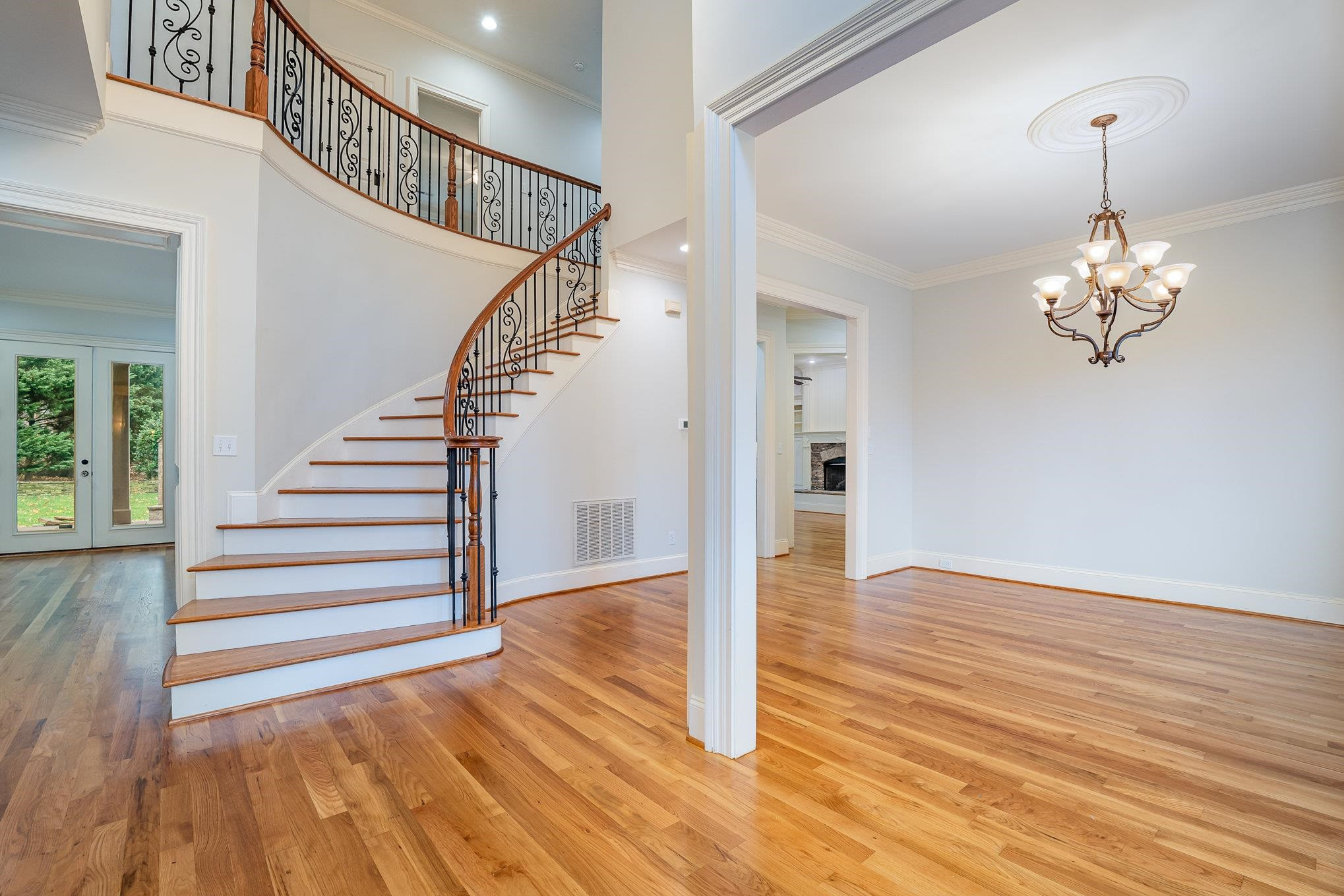 1817 Silver Mist Court Raleigh, NC 27613 - Photo 4 of 40 a view of entryway and hall with wooden floor