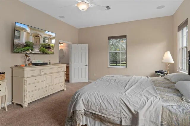a view of a swimming pool with a lake view