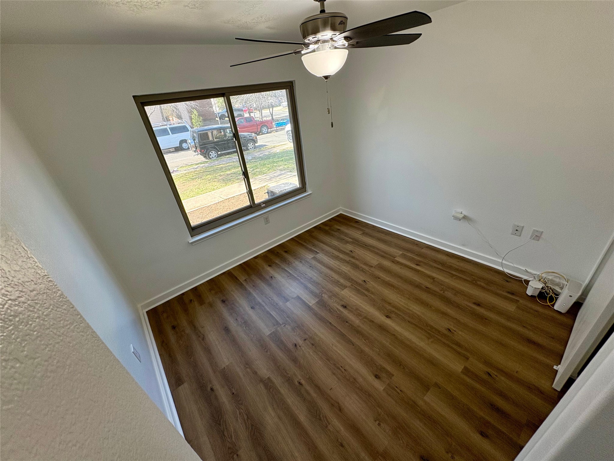 8003 Bannock Lane Austin, TX 78747 - Photo 32 of 40 Bedroom #4 featuring ceiling fan and dark wood finished floors