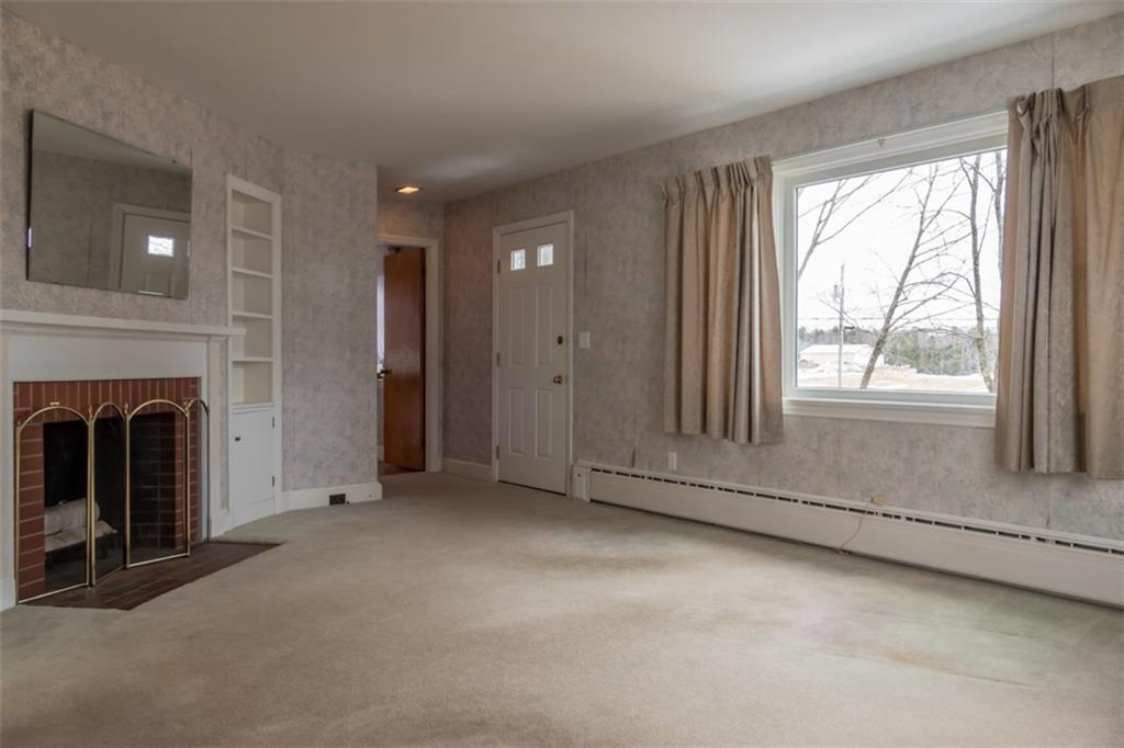 26 Collinsbrook Road Brunswick, ME 04011 - Photo 10 of 35 Spacious living room features a...