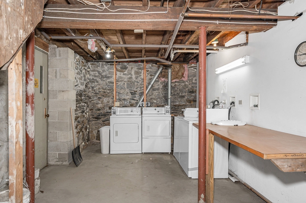 339 Lincoln Street, Unit 2 Lowell, MA 01852 - Photo 14 of 18 a utility room with dryer and washer
