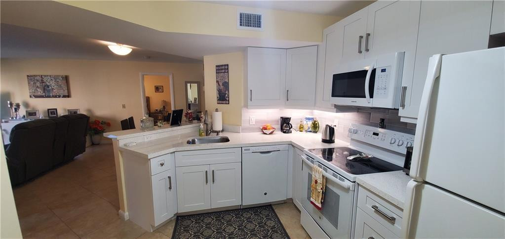 8977 Wiles Road, Unit 206 Coral Springs, FL 33067 - Photo 22 of 50 Photo 12