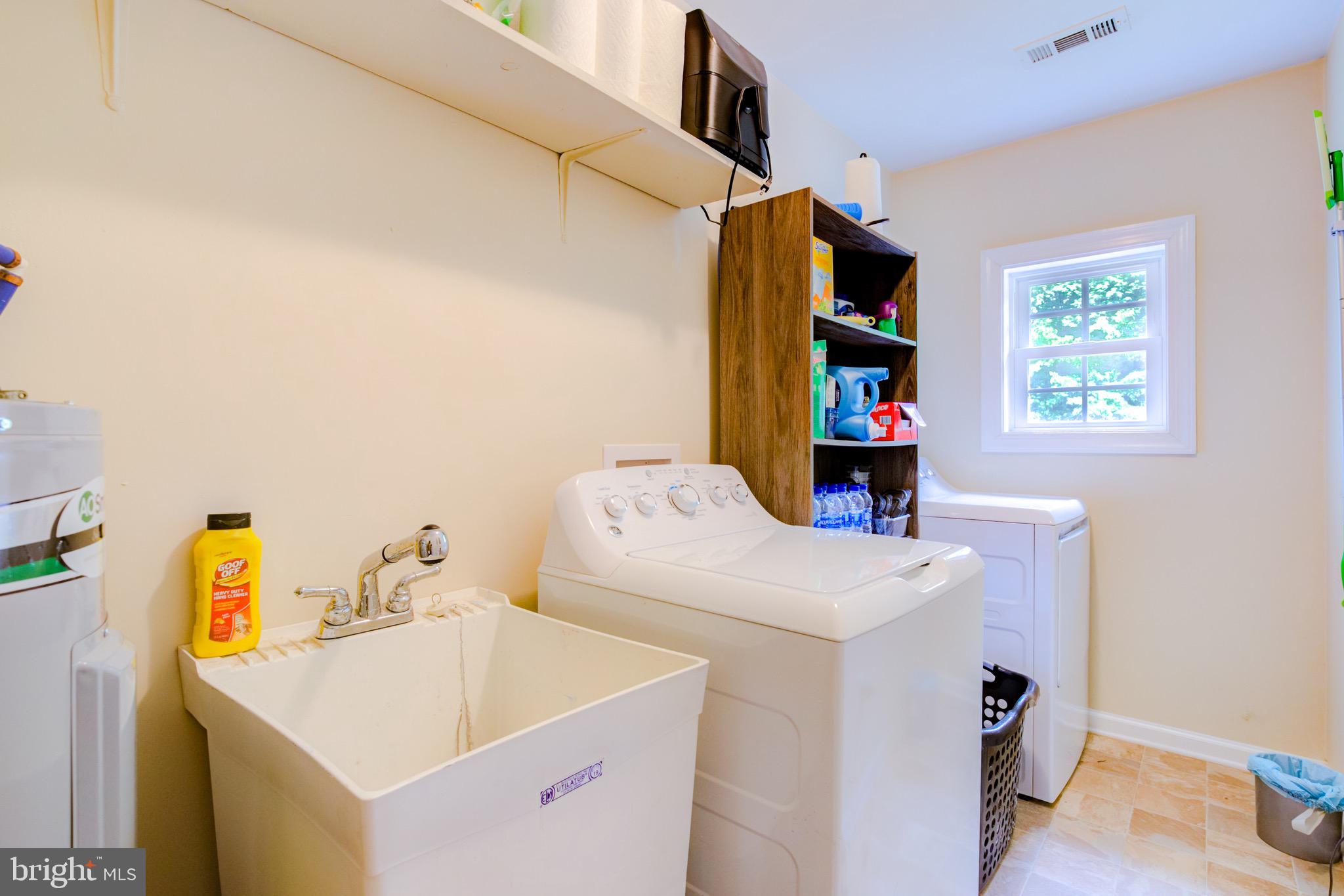 15563 Countyline Church Road Ruther Glen, VA 22546 - Photo 19 of 26 Spacious laundry room & storage area!
