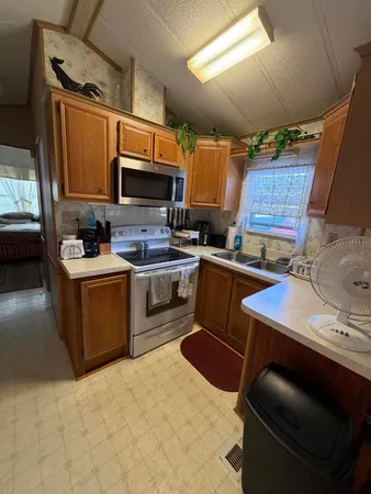 a hallway with washer and dryer
