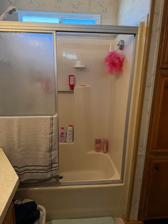 a bathroom with a sink and a bathtub