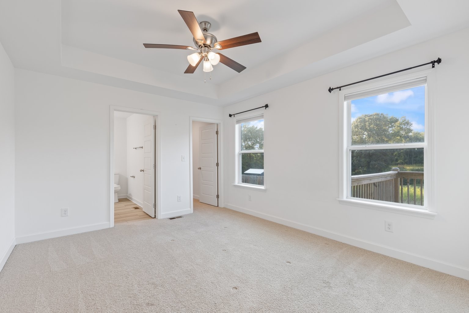 10580 Church Road Bon Aqua, TN 37025 - Photo 12 of 29 an empty room with windows and fan