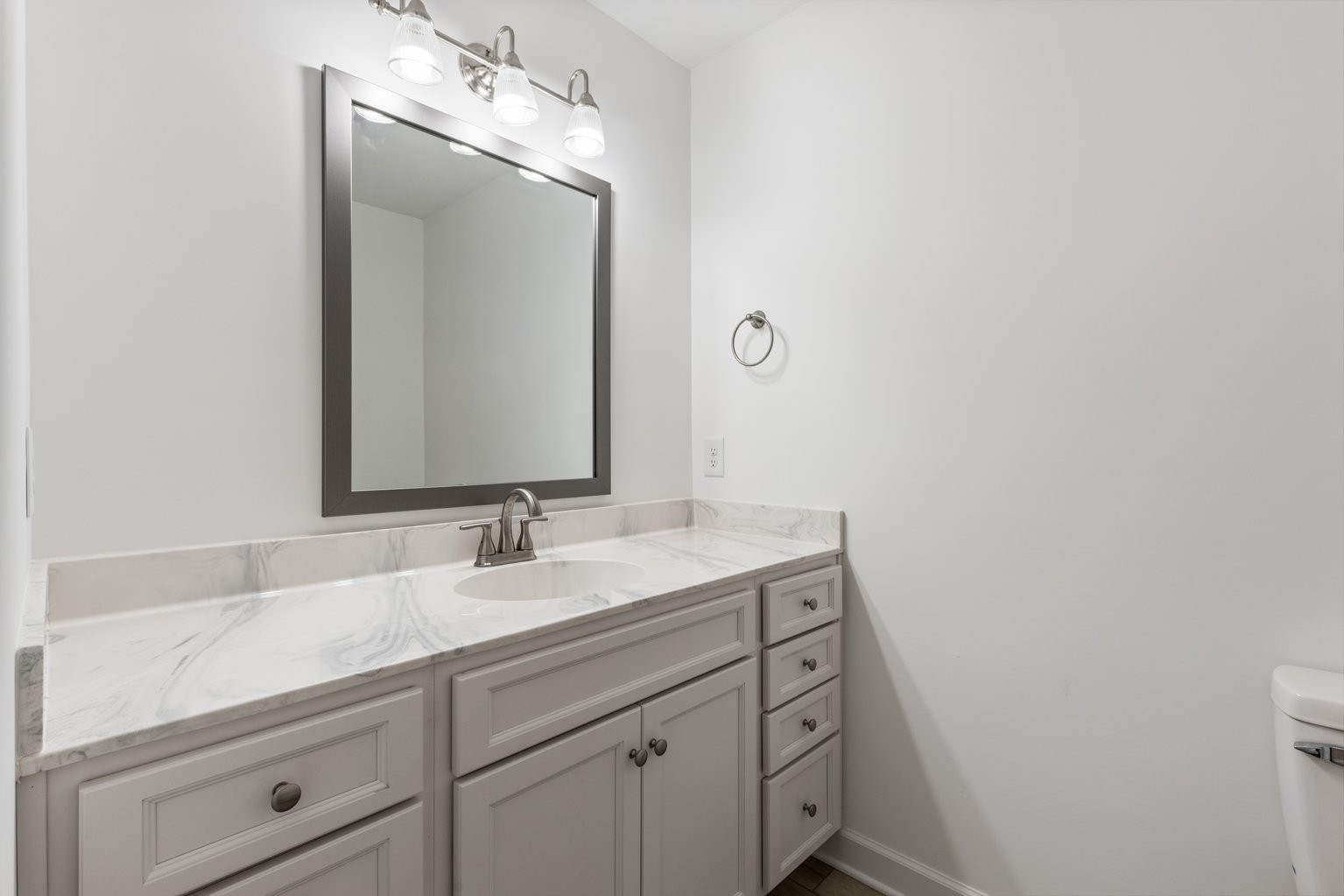 10580 Church Road Bon Aqua, TN 37025 - Photo 15 of 29 a bathroom with a sink and a mirror