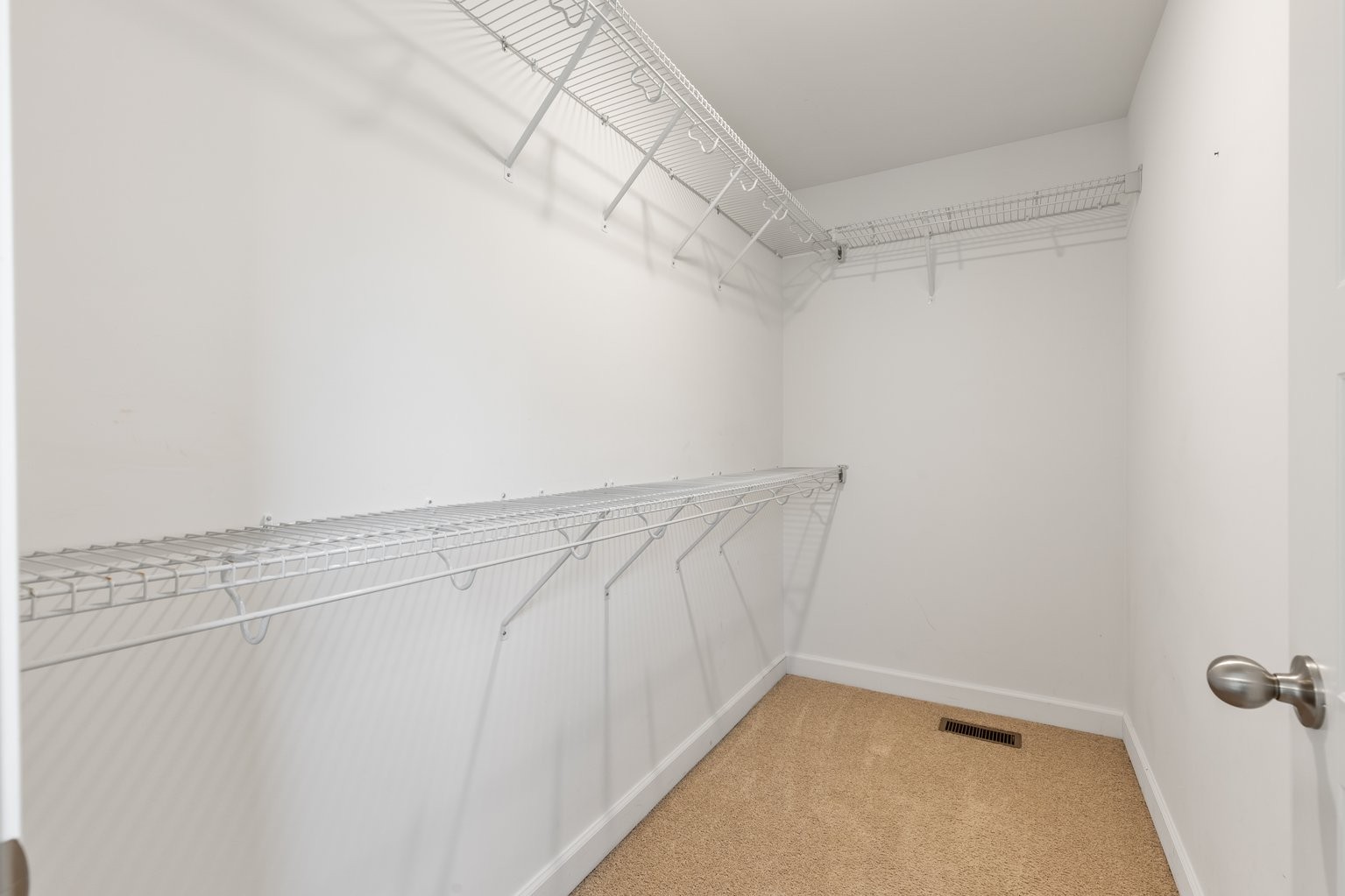 10580 Church Road Bon Aqua, TN 37025 - Photo 17 of 29 a view of a room with racks on the wall