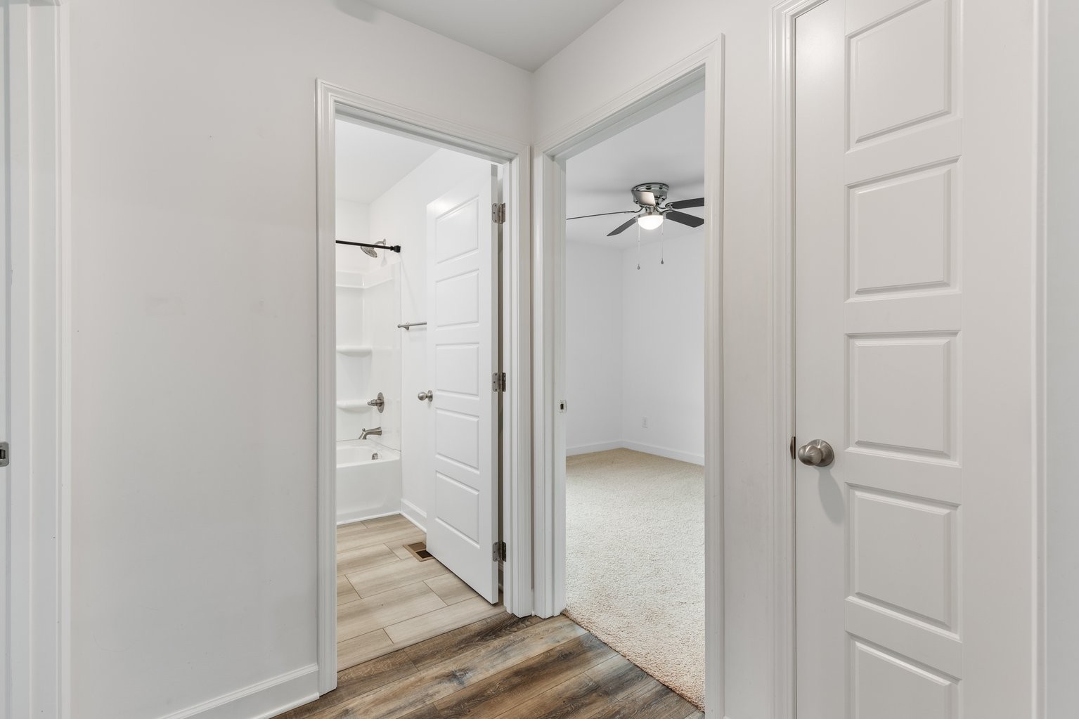 10580 Church Road Bon Aqua, TN 37025 - Photo 20 of 29 wooden floor with white cabinets