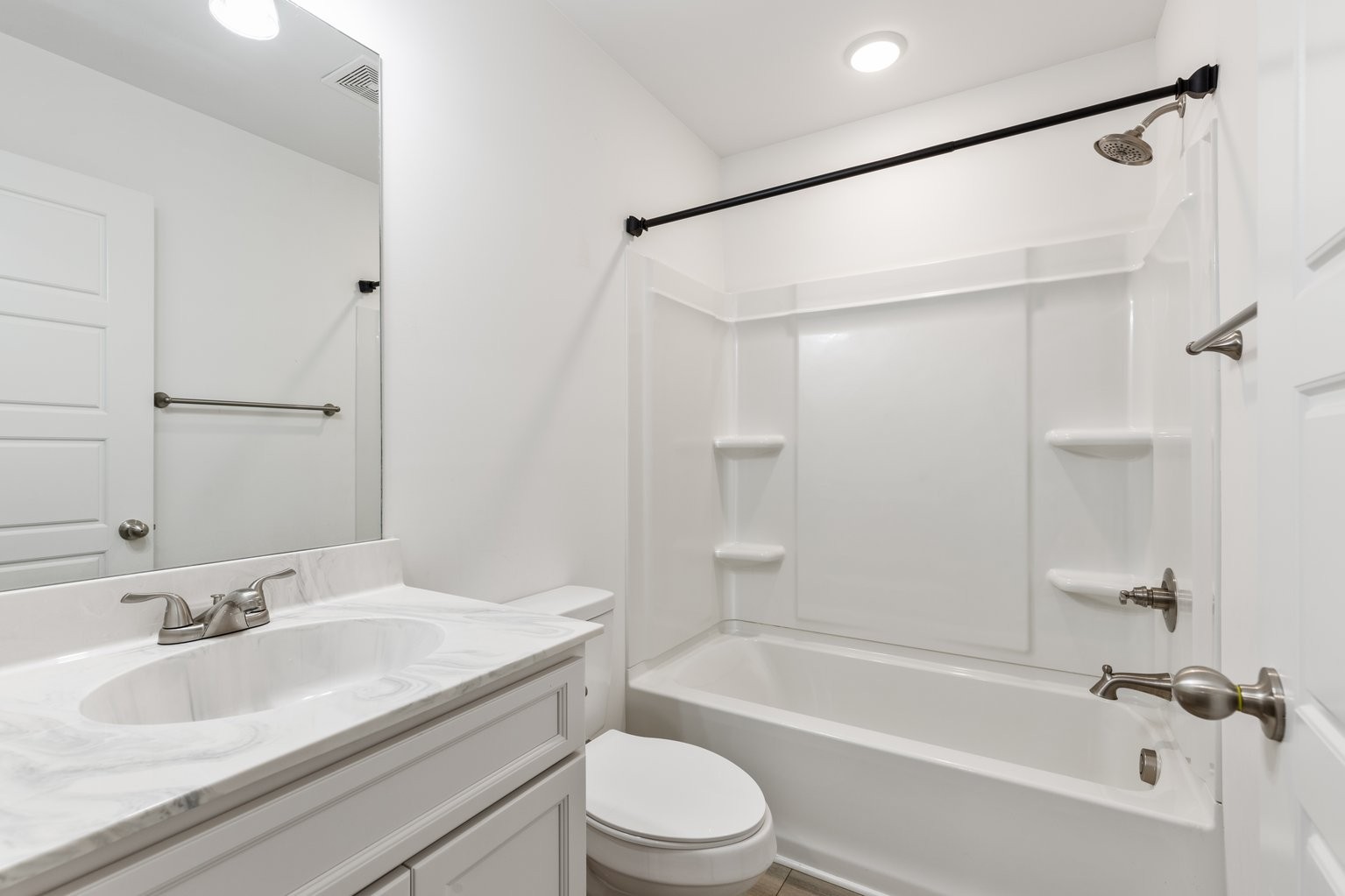 10580 Church Road Bon Aqua, TN 37025 - Photo 21 of 29 a bathroom with a sink toilet and shower