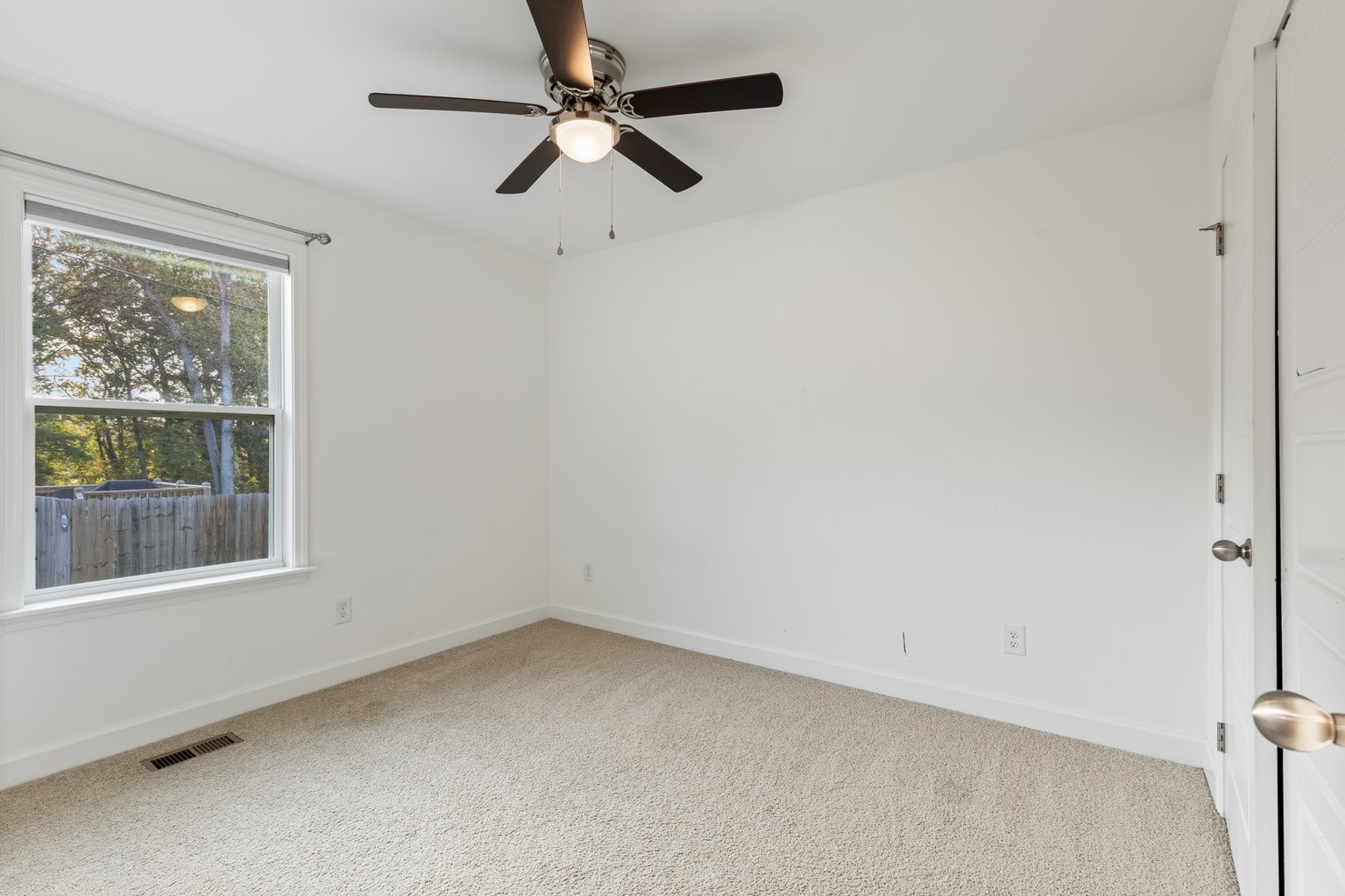 10580 Church Road Bon Aqua, TN 37025 - Photo 22 of 29 an empty room with a window