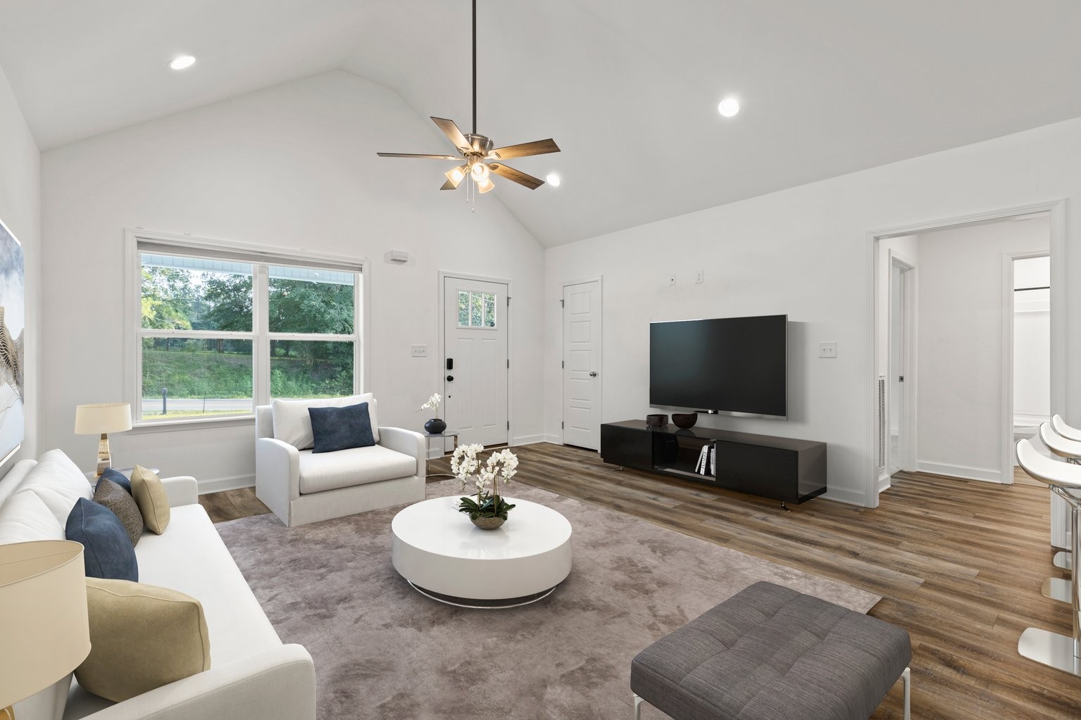 10580 Church Road Bon Aqua, TN 37025 - Photo 4 of 29 a living room with furniture and a flat screen tv
