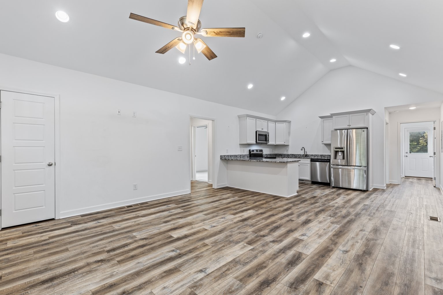 10580 Church Road Bon Aqua, TN 37025 - Photo 5 of 29 a view of kitchen with granite countertop cabinets and refrigerator