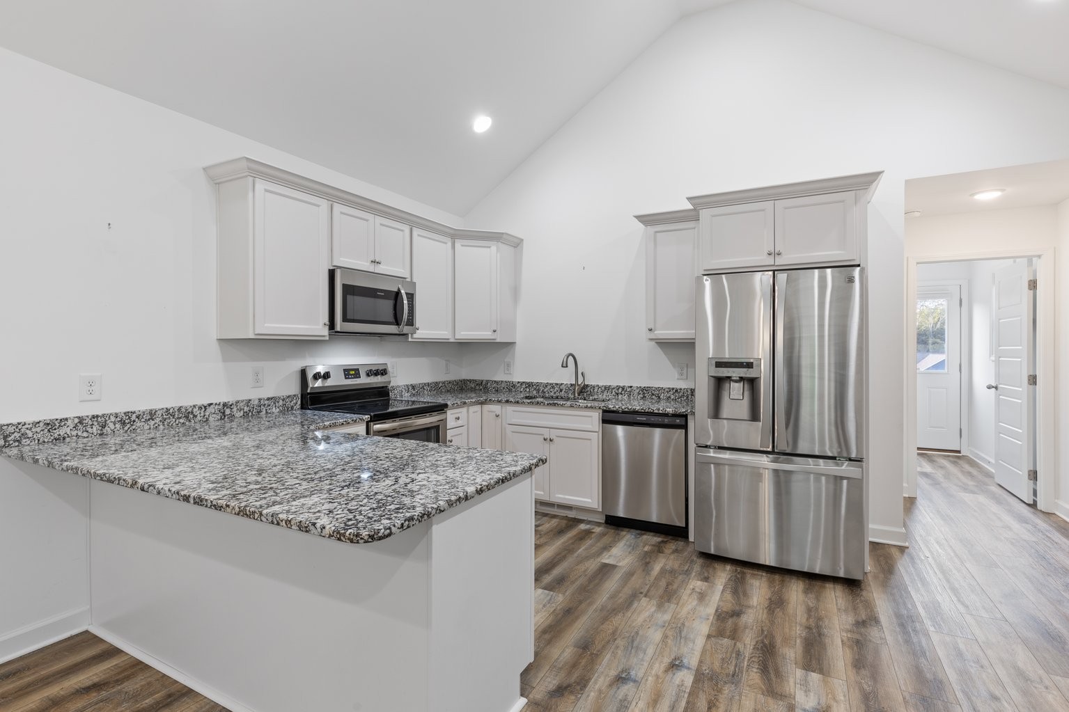 10580 Church Road Bon Aqua, TN 37025 - Photo 7 of 29 a kitchen with a refrigerator sink and microwave