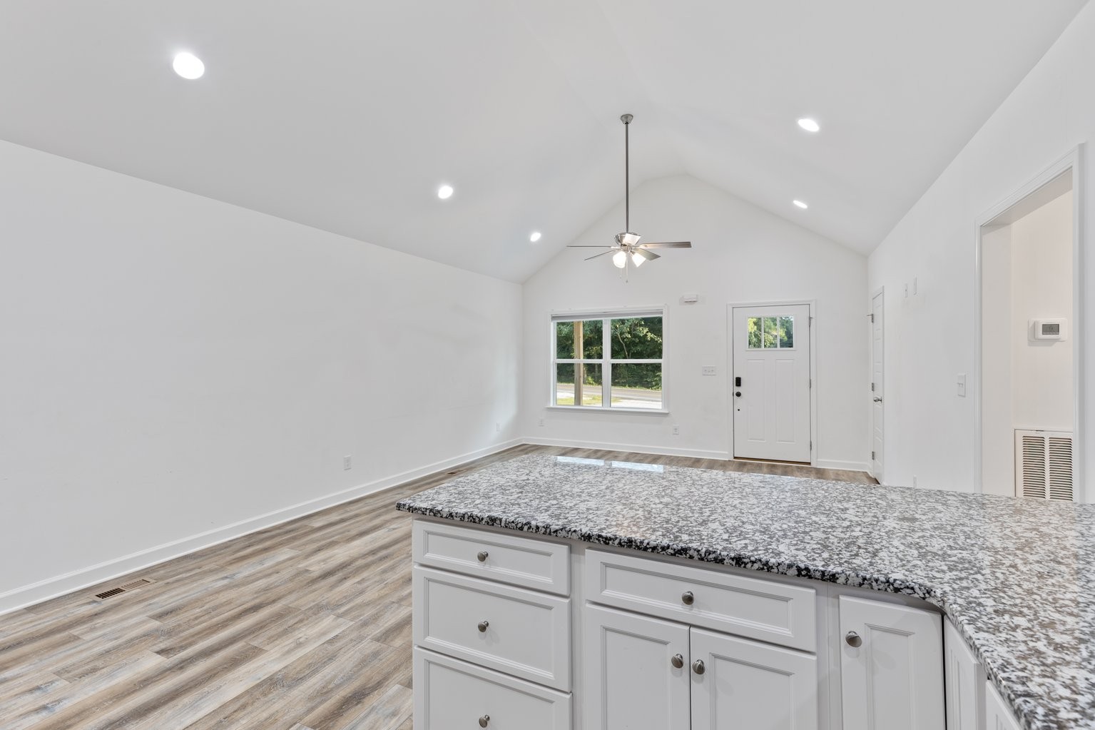 10580 Church Road Bon Aqua, TN 37025 - Photo 10 of 29 a view of a kitchen with granite countertop cabinets and wooden floor