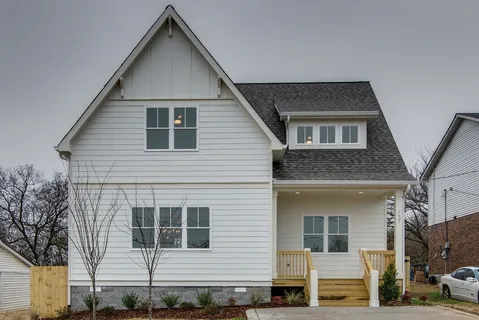 a front view of a house with glass windows
