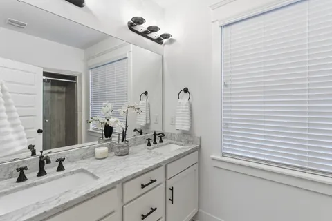a bathroom with a shower and toilet