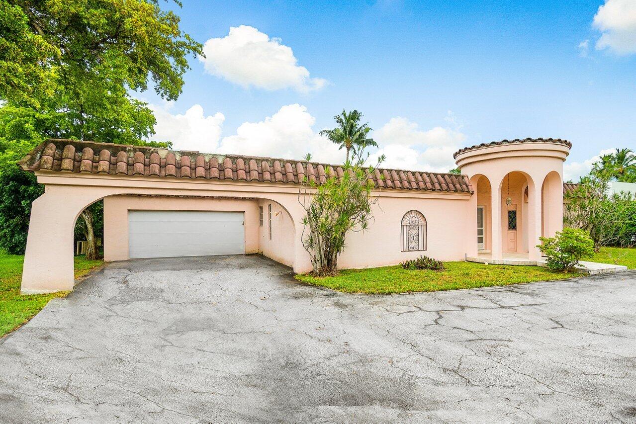 1060 Spanish River Road Boca Raton, FL 33432 - Photo 2 of 37 004-1060SpanishRiverRoad-BocaRaton-FL-33