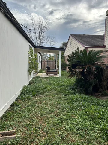 a view of a porch with a yard