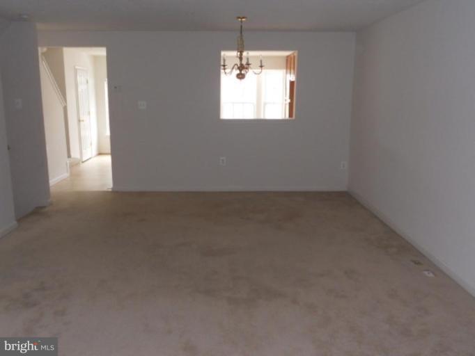 801 Tipton Road Middle River, MD 21220 - Photo 6 of 9 an empty room that has a window in it
