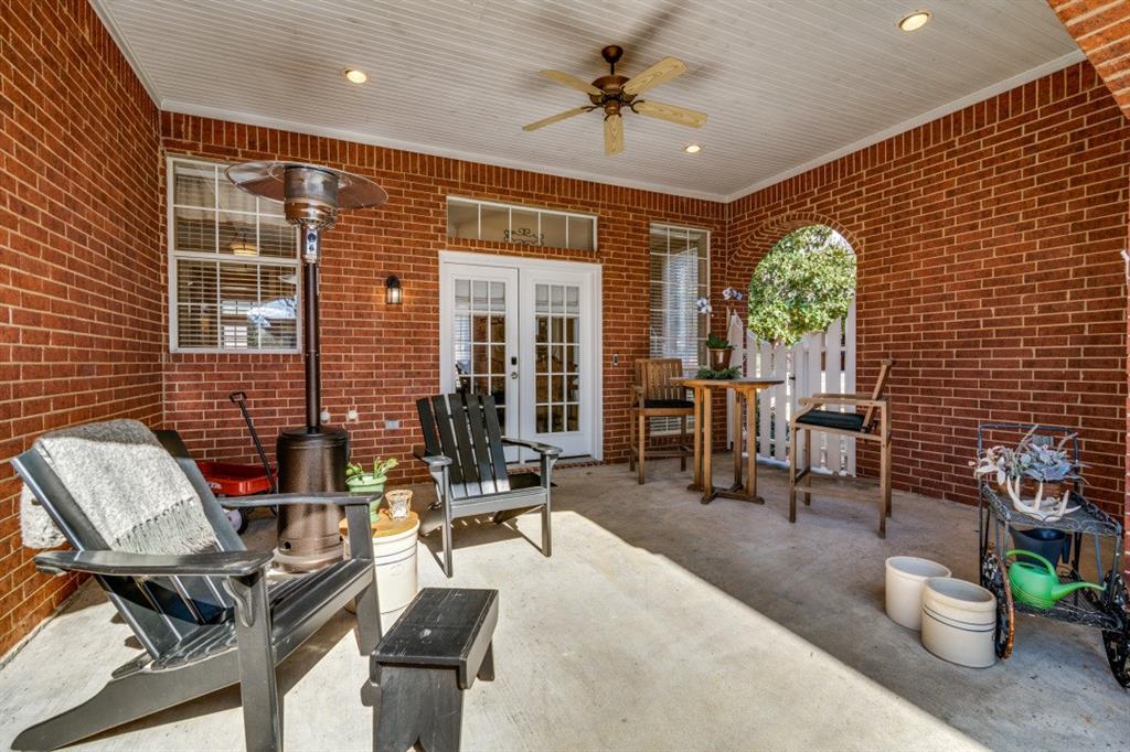 8 Griffith Court Terrell, TX 75160 - Photo 23 of 25 View of patio / terrace featuring french doors and ceiling fan