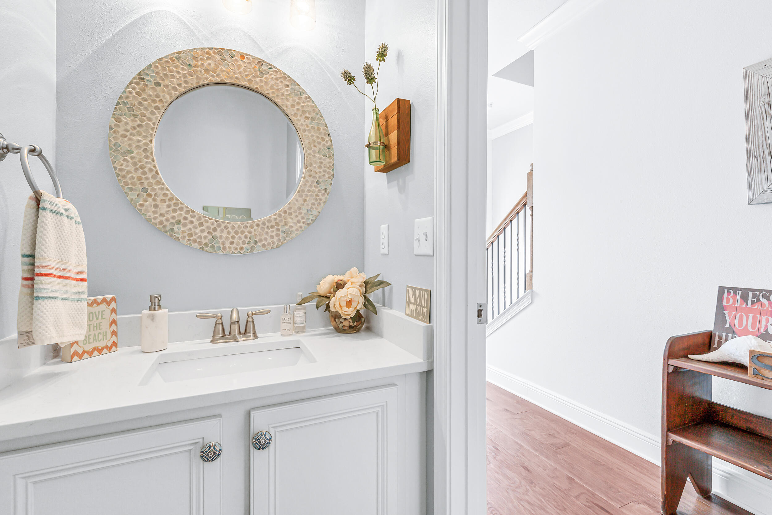 136 Grayling Way Inlet Beach, FL 32461 - Photo 12 of 22 a bathroom with a sink and a mirror